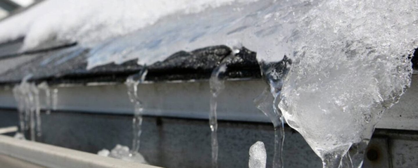 Featured image for “How Can Ice Dams Damage Your Roof?”