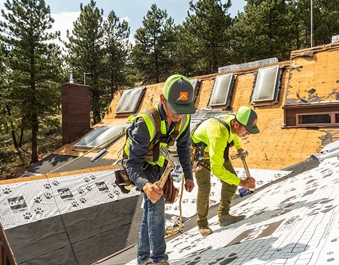 WestPro contractors work on a roof