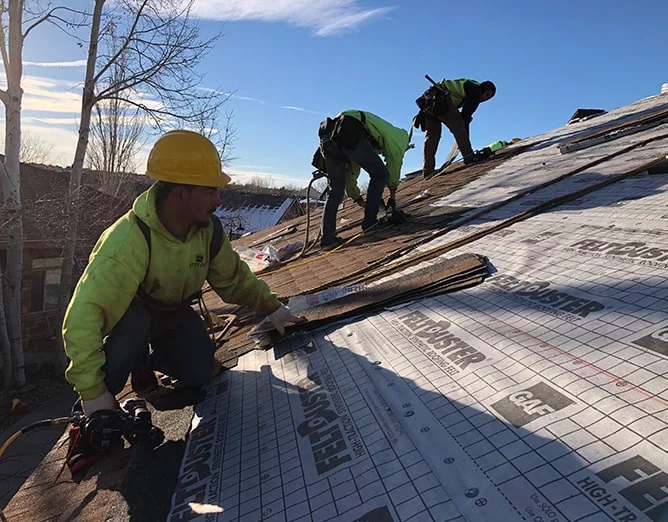 WestPro workers repair a roof