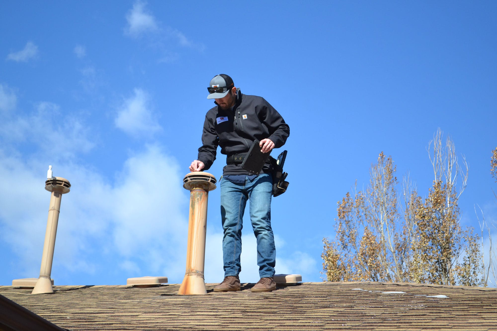 WestPro contractor on a Colorado Roof during a shingles repair job